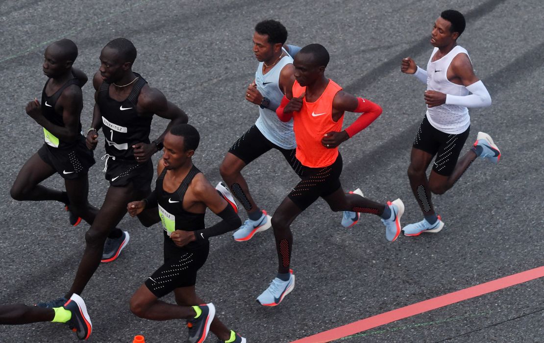 Kipchoge (in red) attempts to go under two hours in Monza in May 2017. 