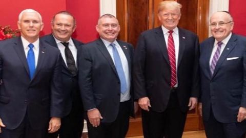 Igor Fruman and Lev Parnas (second and third from left) pictured with Vice President Mike Pence (far left), President Donald Trump and Rudy Giuliani.