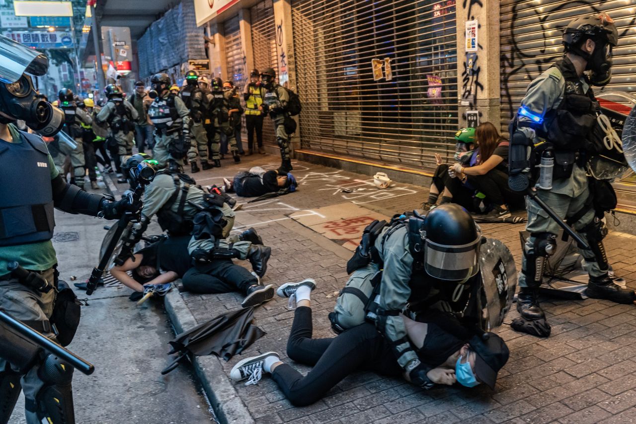 Anti-government protesters are detained by police after <a href="https://www.cnn.com/2019/10/06/asia/hong-kong-unrest-intl-hnk/index.html" target="_blank">violent clashes in Hong Kong</a> on Sunday, October 6. <a href="http://www.cnn.com/2019/06/09/world/gallery/hong-kong-extradition-protest/index.html" target="_blank">Protests in Hong Kong</a> have been taking place periodically since early June.