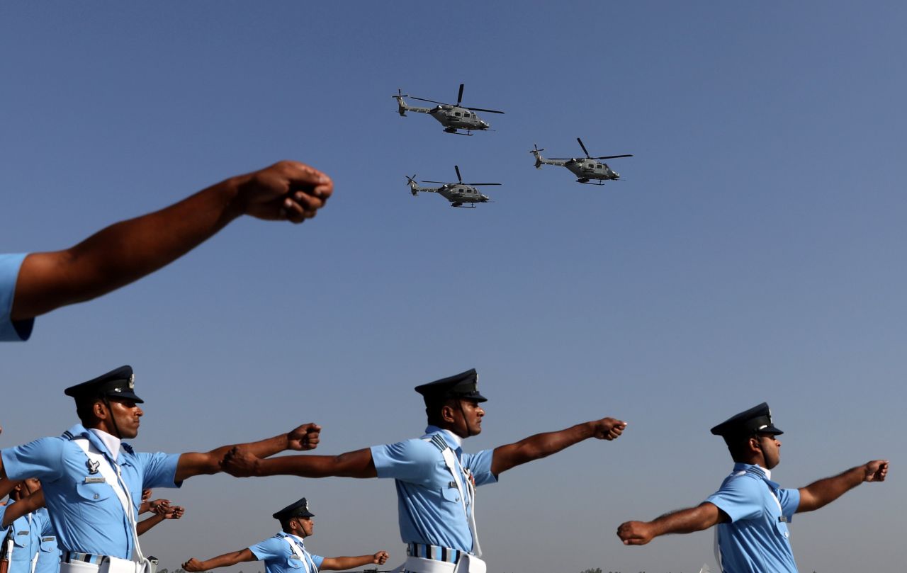 Soldiers march in New Delhi during Indian Air Force Day celebrations on Tuesday, October 8.