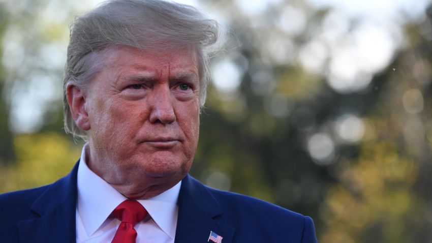 US President Donald Trump looks on as he speaks to the media prior to departing from the South Lawn of the White House in Washington, DC on October 10, 2019 on his way to Minnesota for a rally.