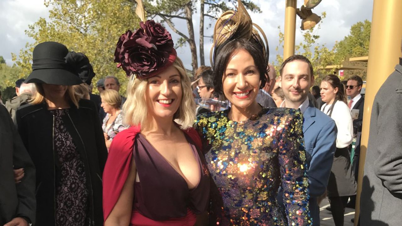 Carly Gasper (left) and Marie Brown were among those in spectacular outfits at Longchamp.