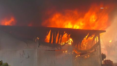 The fire has burned multiple buildings in the Villa Calimesa Mobile Home Park.