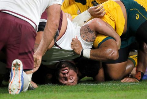 Georgia's Beka Gigashvili reacts as a scrum collapses to the ground during the game at Shizuoka Stadium Ecopa between Australia and Georgia in Shizuoka. 