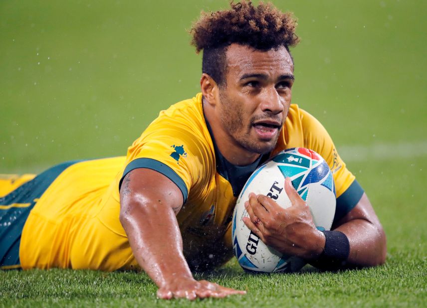 Australia's Will Genia reacts after scoring a try against Georgia. 