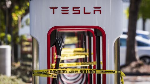 Tesla chargers in San Ramon, California, are tied off with caution tape as PG&E's massive blackout swept across Northern California.