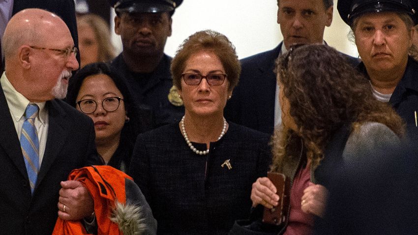 Former US Ambassador to Ukraine Marie Yovanovitch (C) arrives for a closed-doors deposition before members of the House of Representatives, on October 11, 2019, in Washington.