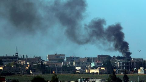 Smoke billows from Tal Abyad, Syria, on Friday, October 11.