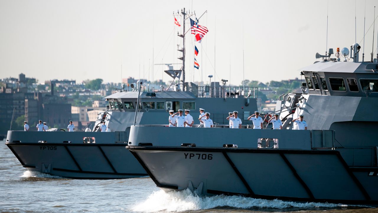 Two US Navy training vessels take part in the parade for Fleet Week 2019 in New York. 