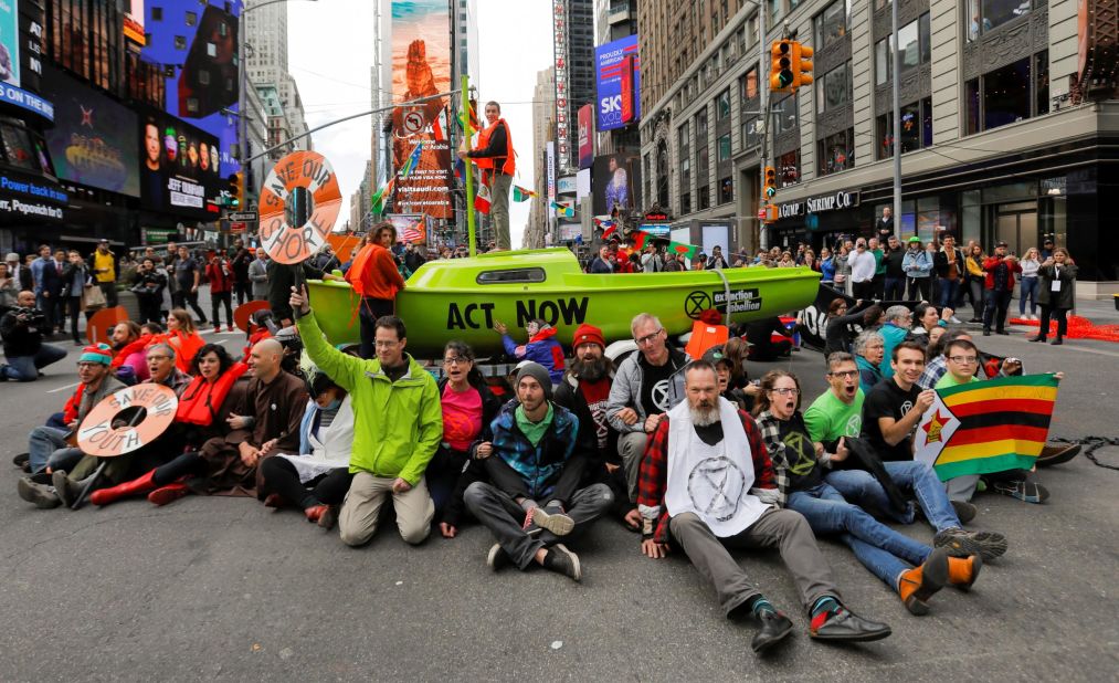 Climate activists participate in an Extinction Rebellion protest in New York's Times Square on Thursday, October 10. 