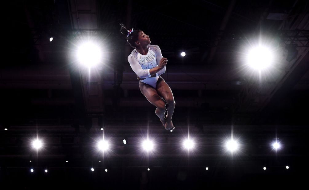 Simone Biles competes in the floor exercise during the World Championships in Stuttgart, Germany, in October 2019.
