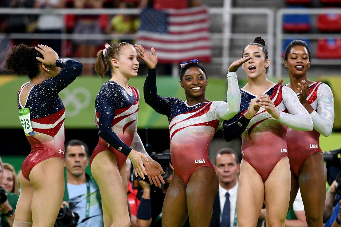 Laurie Hernandez, Madison Kocian, Simone Biles, Aly Raisman and Gabby Douglas of the United States celebrate winning the team gold medal at the Rio 2016 Olympic Games in 2016.