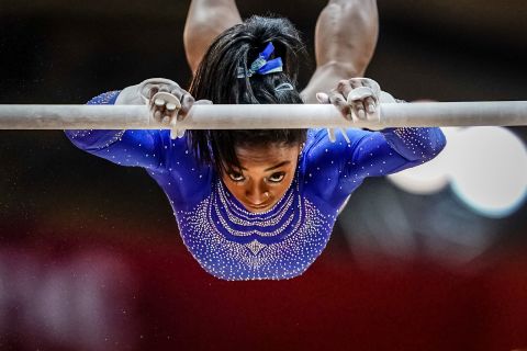 Biles competes on the uneven bars during the 2018 World Championships.