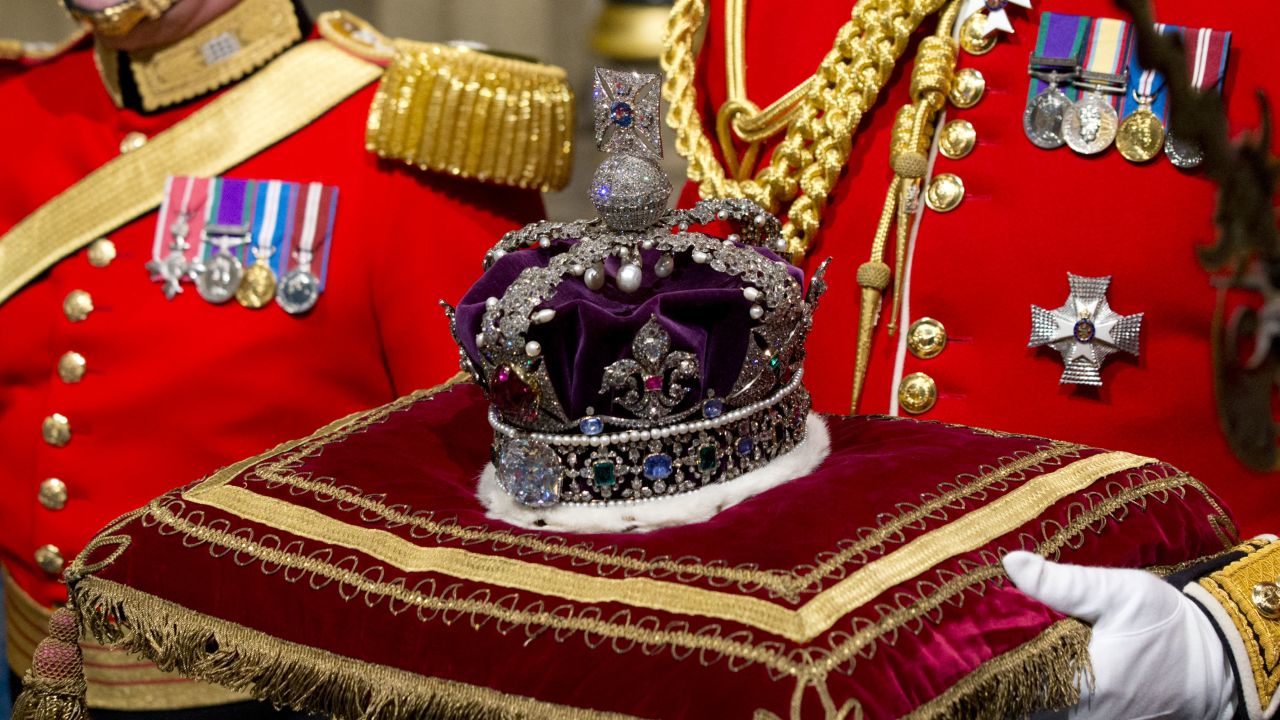 Queen Elizabeth II's Imperial State Crown is carried through Norman Porch ahead of the State Opening of Parliament in 2016.