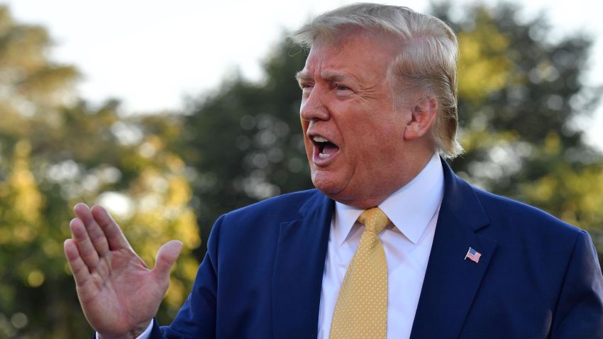 US President Donald Trump speaks to the press after announcing and initial deal with China on the South Lawn of the White House before departing to Lake Charles, Louisiana to hold a campaign rally on October 11.