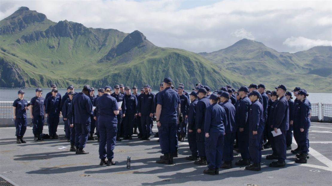 Crew on deck of the USCG Healy, stationed at Unalaska in the Aleutian Islands, Alaska. The Healy is the only US icebreaker currently operating in the northern hemisphere.