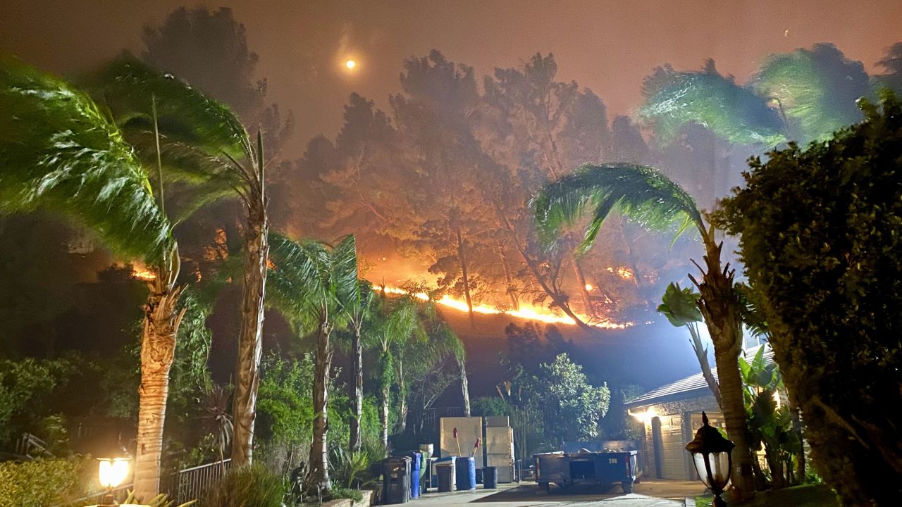 A photo taken by Andro Mammo shows the Porter Ranch neighborhood in Los Angeles engulfed in flames.