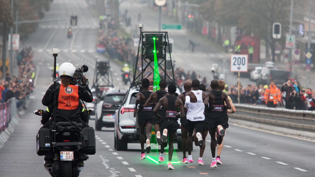 Kipchoge was assisted by an army of 30 pacemakers. A pace car emitted a green laser to help keep time.