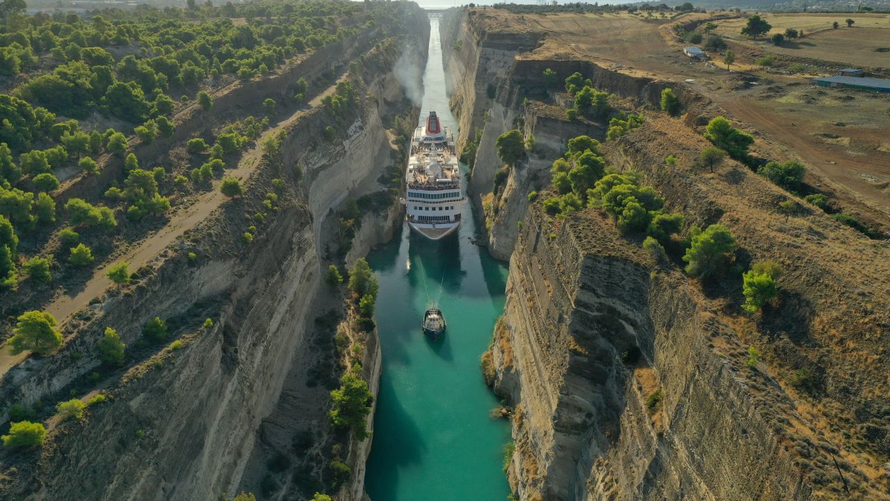 The Corinth Canal connects the Gulf of Corinth with the Saronic Gulf.