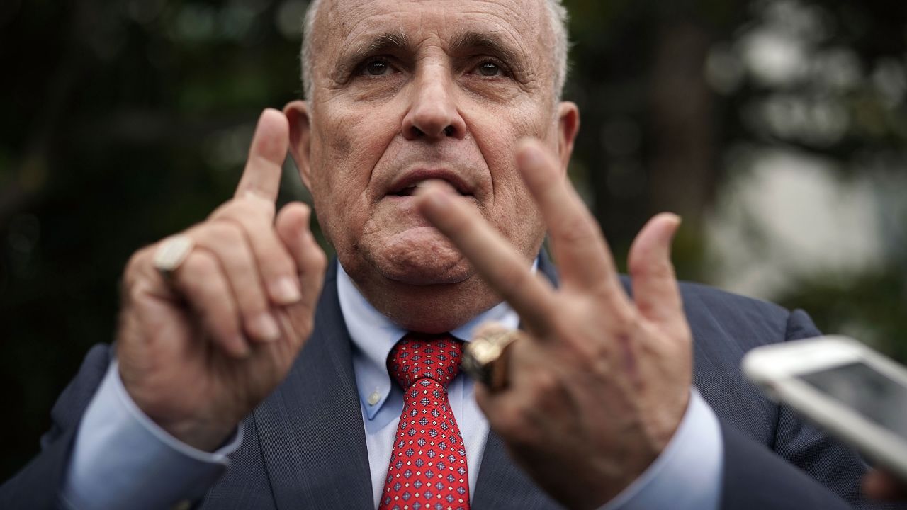 WASHINGTON, DC - MAY 30:  Rudy Giuliani, former New York City mayor and current lawyer for U.S. President Donald Trump, speaks to members of the media during a White House Sports and Fitness Day at the South Lawn of the White House May 30, 2018 in Washington, DC. President Trump hosted the event to encourage children to participate in sports and make youth sports more accessible to economically disadvantaged students.  (Photo by Alex Wong/Getty Images)