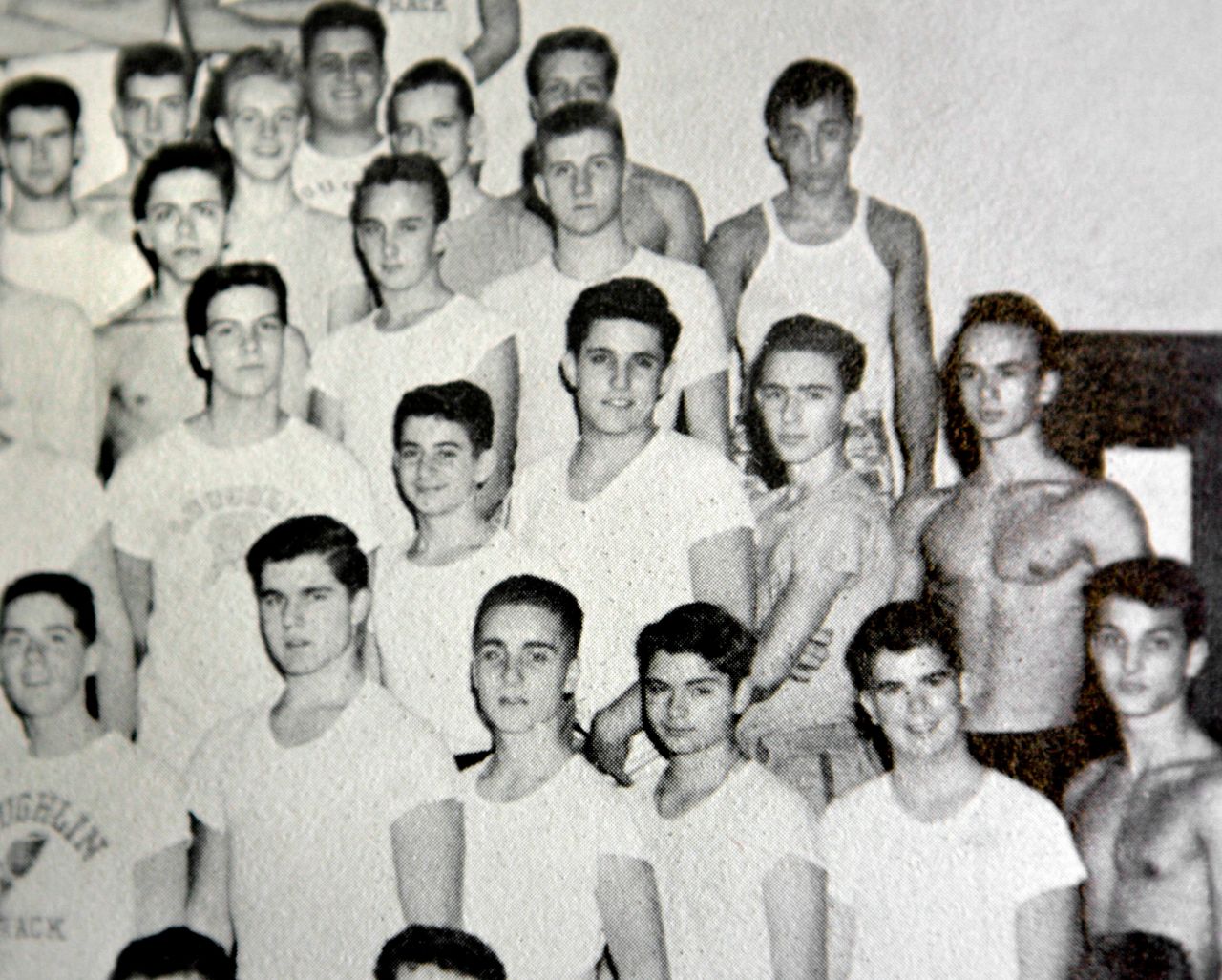 A young Giuliani is seen in the second row, third from right, in this high school yearbook photo from 1960. Giuliani is posing with other members of the weightlifting team at New York's Bishop Loughlin Memorial High School.