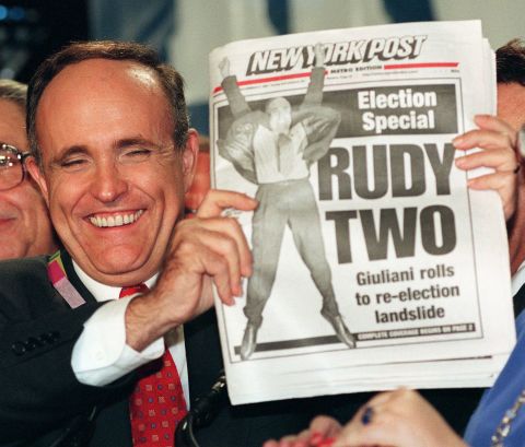 Giuliani celebrates his re-election in 1997. He was widely credited with New York's revitalization during the 1990s, when crime dropped significantly and the economy boomed.