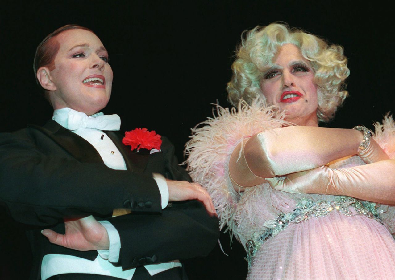 Giuliani, right, is dressed in drag while singing with Julie Andrews at an Inner Circle dinner in March 1997. The annual event is where New York City's journalists satirize city, state and national politics. Giuliani's act was a rebuttal to the Inner Circle's play entitled Citizen Pain.