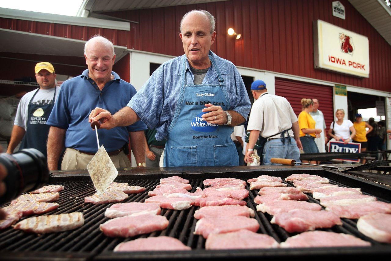 Giuliani cooks pork at the Iowa State Fair while campaigning for president in August 2007.