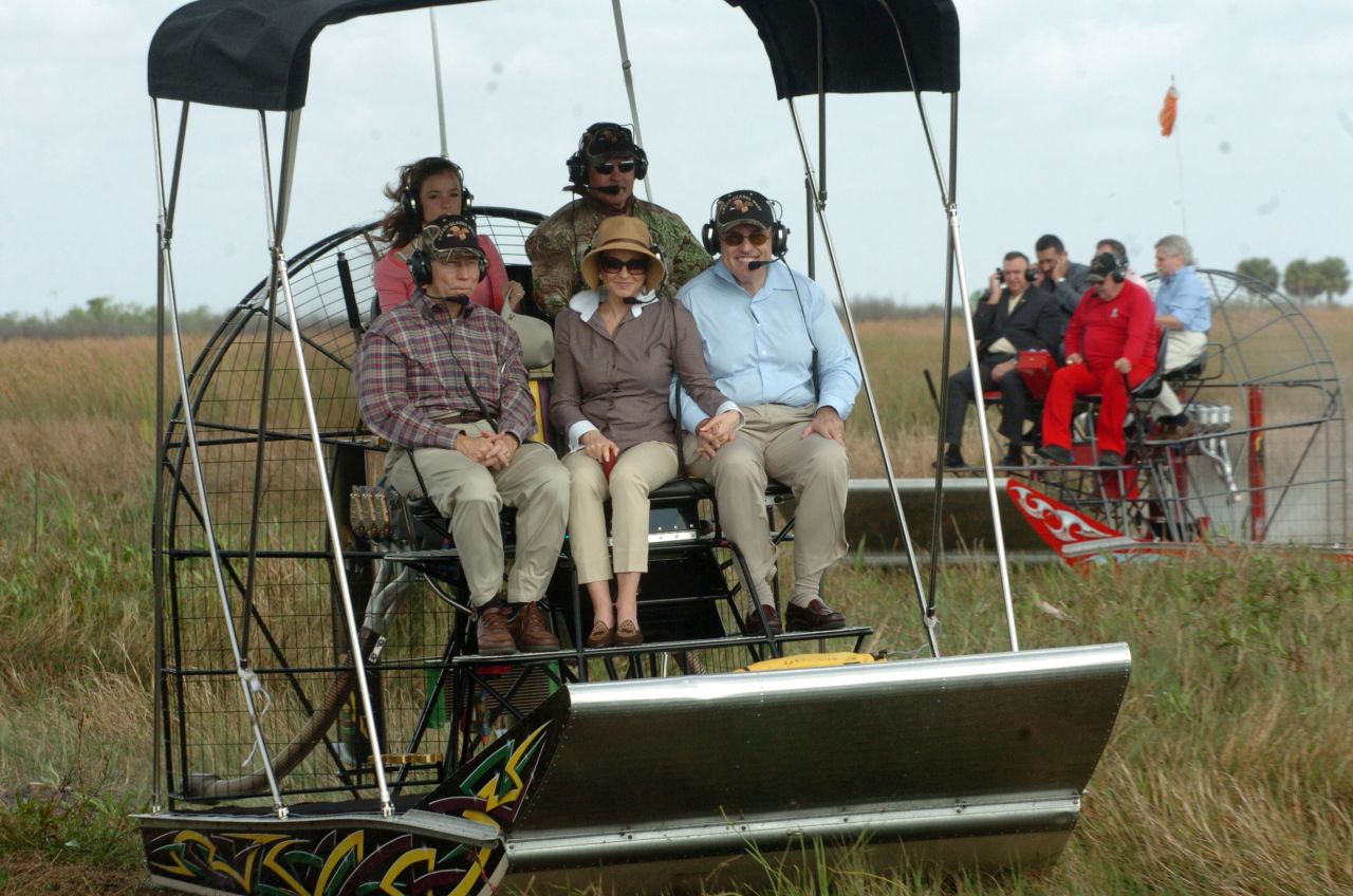 Giuliani, right, and his wife, Judi, tour Florida's Everglades in January 2008. Giuliani dropped out of the presidential race later that month and endorsed US Sen. John McCain.