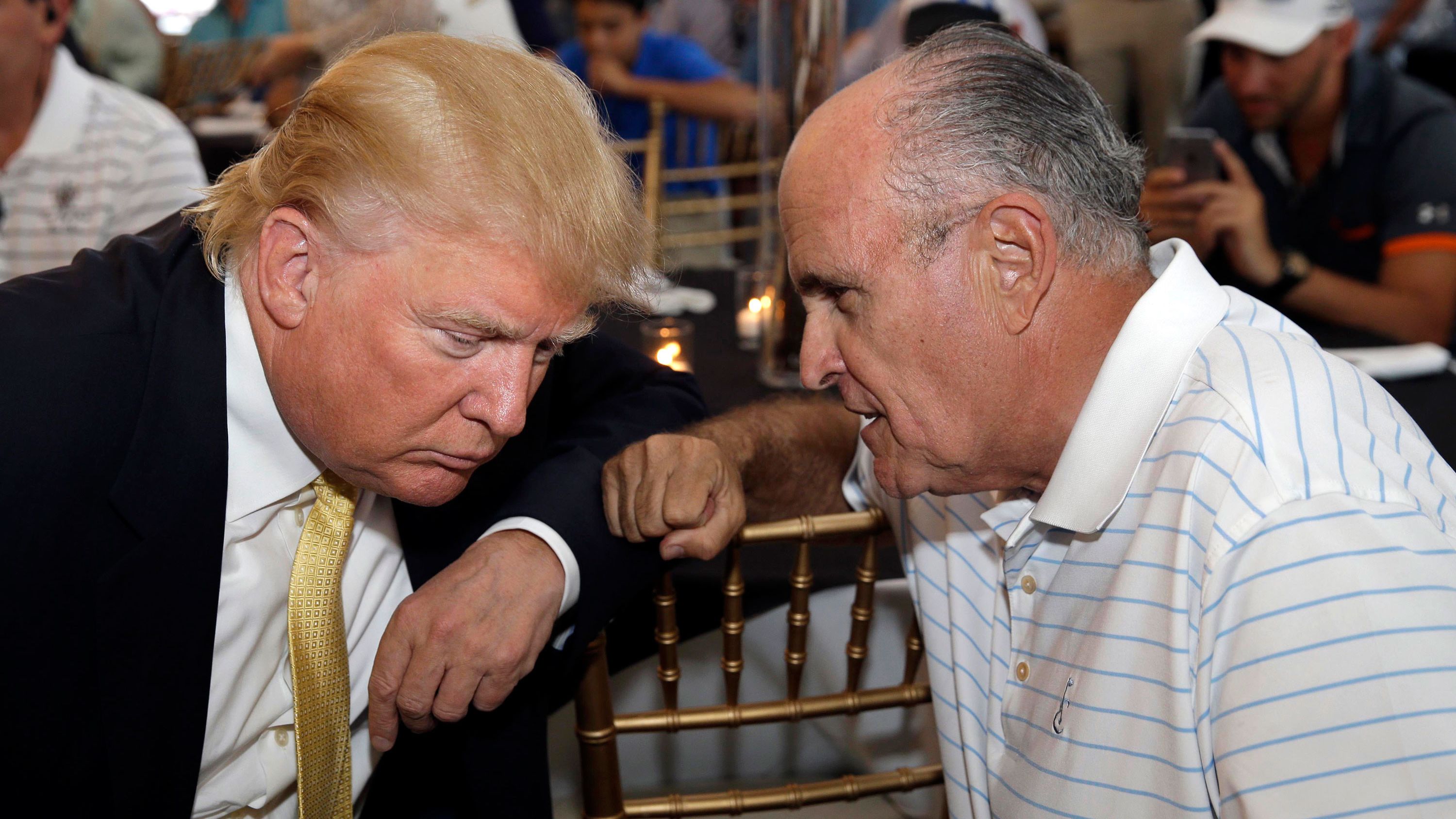 Giuliani talks to Trump at a fundraising event in July 2015. Trump had just announced his presidential campaign a month earlier.
