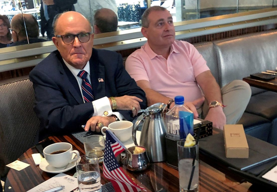 Rudy Giuliani has coffee with Lev Parnas at the Trump International Hotel in Washington, in September 2019.