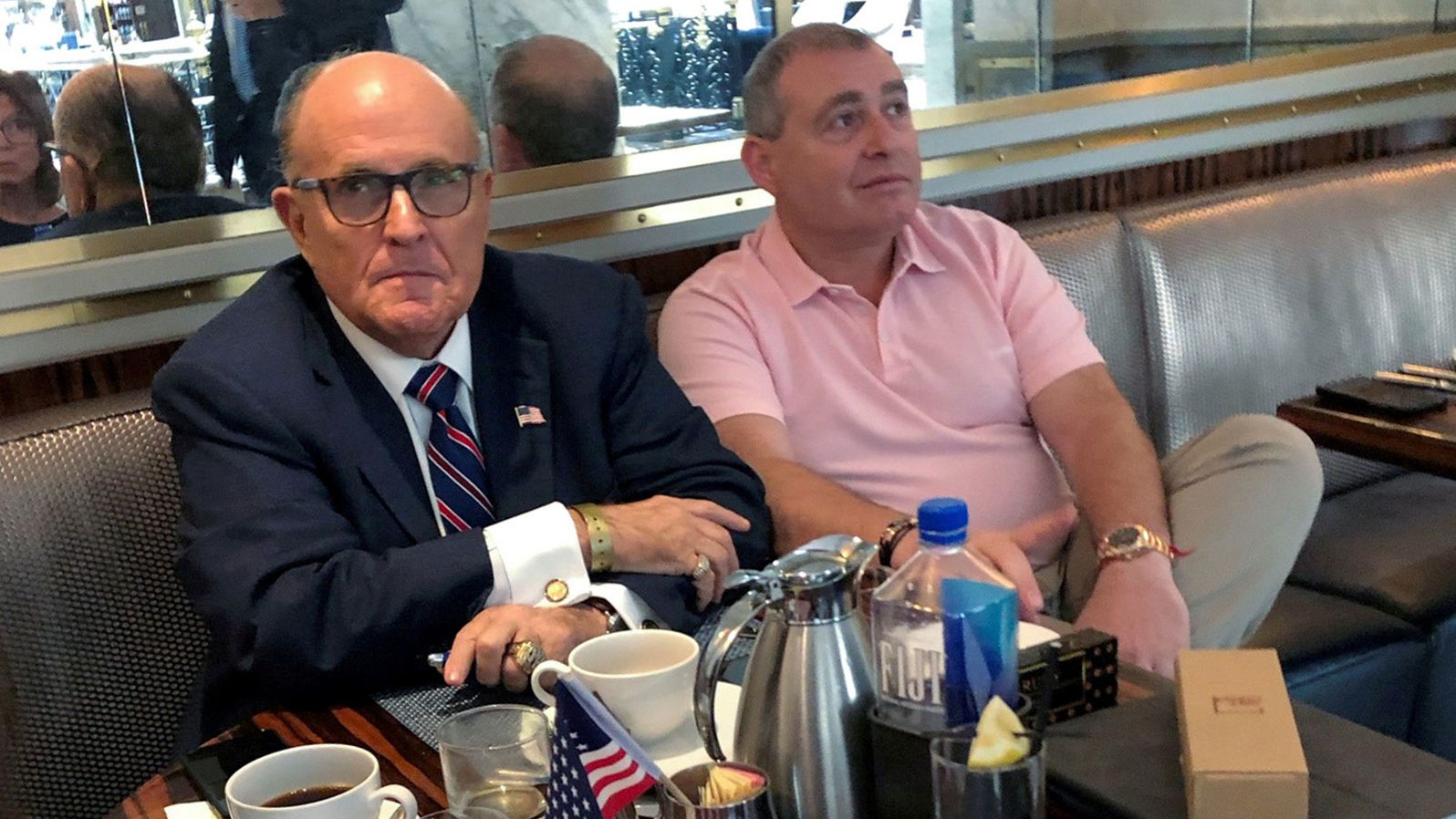 Giuliani has coffee with Ukrainian-American businessman Lev Parnas at the Trump International Hotel in Washington in 