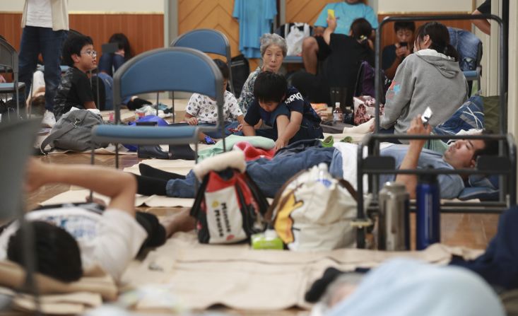 Evacuees gather in a junior high school gymnasium in Shizuoka, Japan, on October 12.