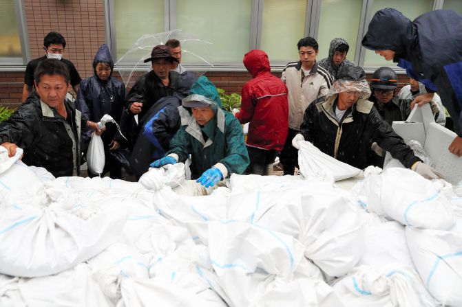 Residents collect sandbags as Typhoon Hagibis approaches Tokyo, Japan on October 12.