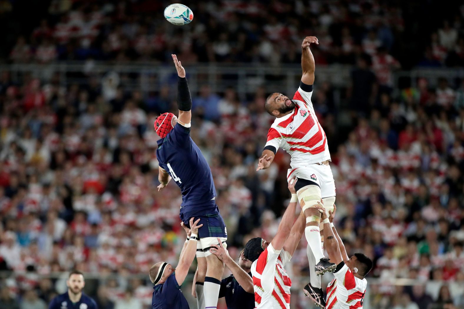 Japan's Michael Leitch misses the lineout ball. Japan will face South Africa in the semi-finals.