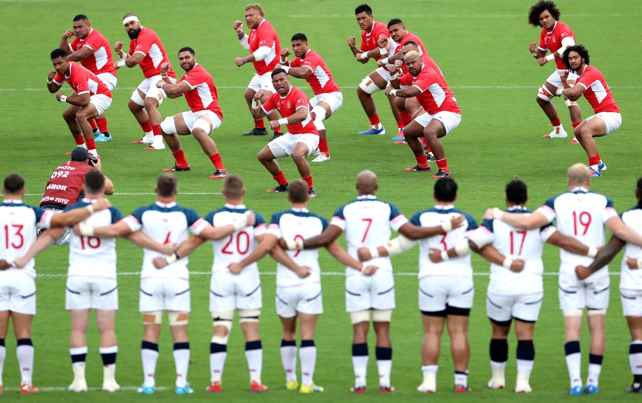 The Tonga players perform the Sipi Tau prior to the Group C game between USA and Tonga at Hanazono Rugby Stadium in Osaka, Japan on Sunday.