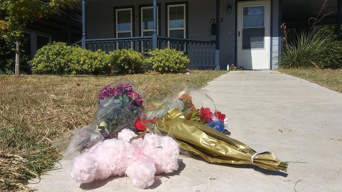 Flowers are laid out in front of the home where 28-year-old Atatiana Koquice Jefferson was shot and killed by a police officer.