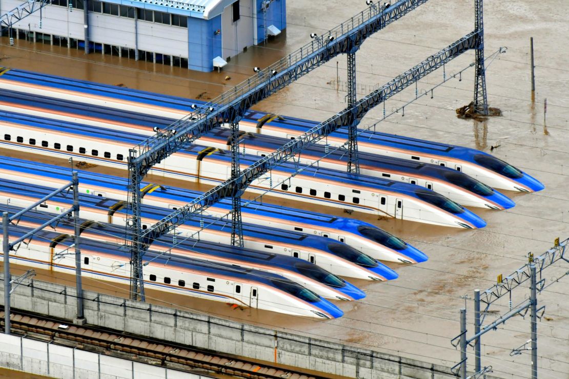 In this aerial image, Hokuriku Shinkansen train depot is submerged after river banks of Chikumagawa River collapse by the rain triggered by Typhoon Hagibis on October 13, 2019 in Nagano, Japan. 