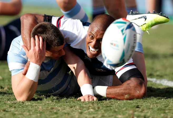 Marcel Brache of the United States, right, tackles Argentina's Gonzalo Bertranou during their Pool C match of the Ruby World Cup in Kumagaya, Japan, on October 9.