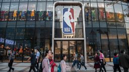 BEIJING, CHINA - OCTOBER 09: People walk by the NBA flagship retail store on October 9, 2019 in Beijing, China. The NBA is trying to salvage its brand in China amid criticism of its handling of a controversial tweet that infuriated the government and has jeopardized the leagues Chinese expansion. The crisis, triggered by a Houston Rockets executives tweet that praised protests in Hong Kong, prompted the Chinese Basketball Association to suspend its partnership with the league. The backlash continued with state-owned television CCTV scrapping its plans to broadcast pre-season games in Shanghai and Shenzhen, and the cancellation of other promotional fan events. The league issued an apology, though NBA Commissioner Adam Silver angered Chinese officials further when he defended the right of players and team executives to free speech. China represents a lucrative market for the NBA, which stands to lose millions of dollars in revenue and threatens to alienate Chinese fans.  Many have taken to Chinas social media platforms to express their outrage and disappointment that the NBA would question the countrys sovereignty over Hong Kong which has been mired in anti-government protests since June.(Photo by Kevin Frayer/Getty Images)
