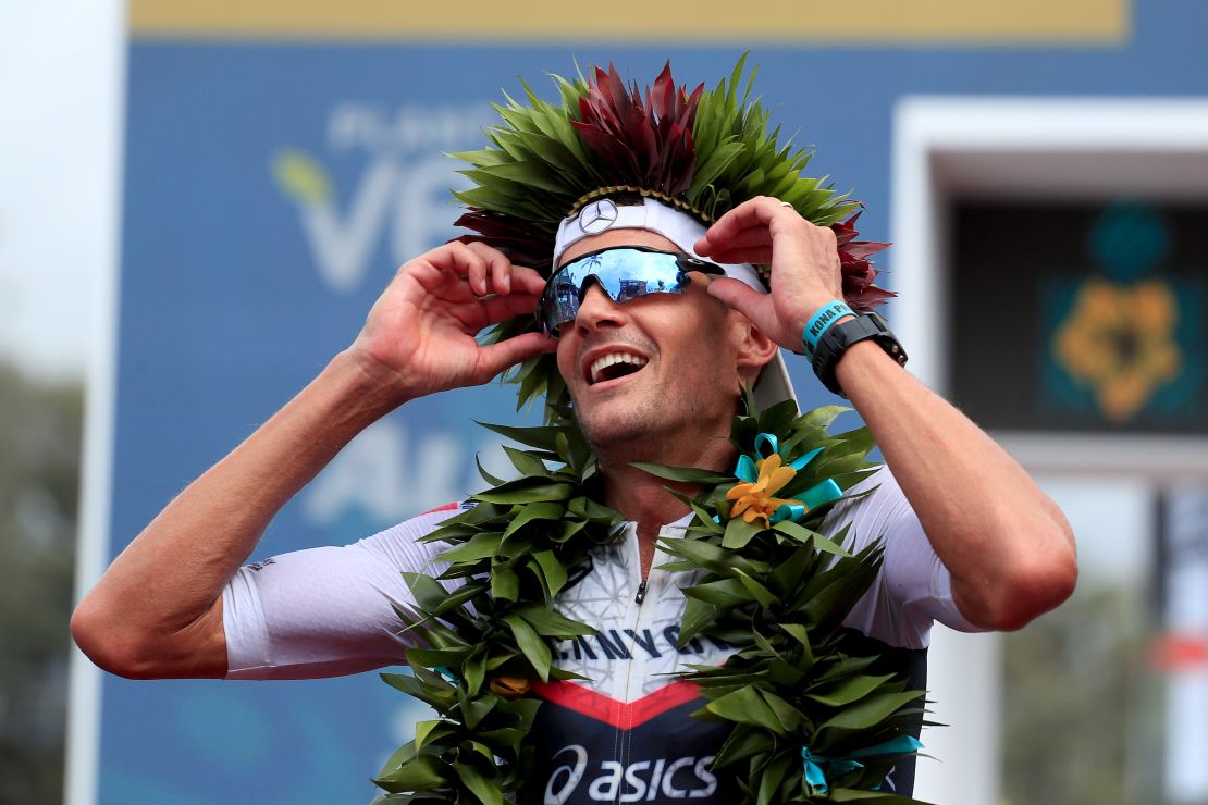 Jan Frodeno celebrates after winning the Ironman World Championships in Kailua Kona, Hawaii.