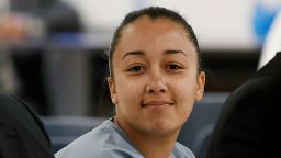 FILE - In this May 23, 2018, file pool photo, Cyntoia Brown, a woman serving a life sentence for killing a man when she was a 16-year-old girl, smiles at family members during her clemency hearing at Tennessee Prison for Women in Nashville, Tenn. Brown, championed by celebrities as a symbol of unfair sentencing, was released early Wednesday, Aug. 7, 2019, from the Tennessee Prison for Women, where she had been serving a life sentence for killing a man who had picked her up for sex at 16. (Lacy Atkins/The Tennessean via AP, Pool, File)