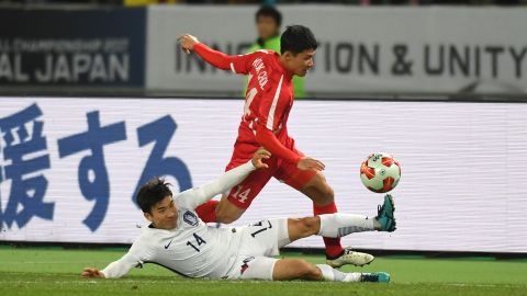 Kang Kuk Chol of North Korea is tackled by Go Yohan of South Korea during a 2017 clash.