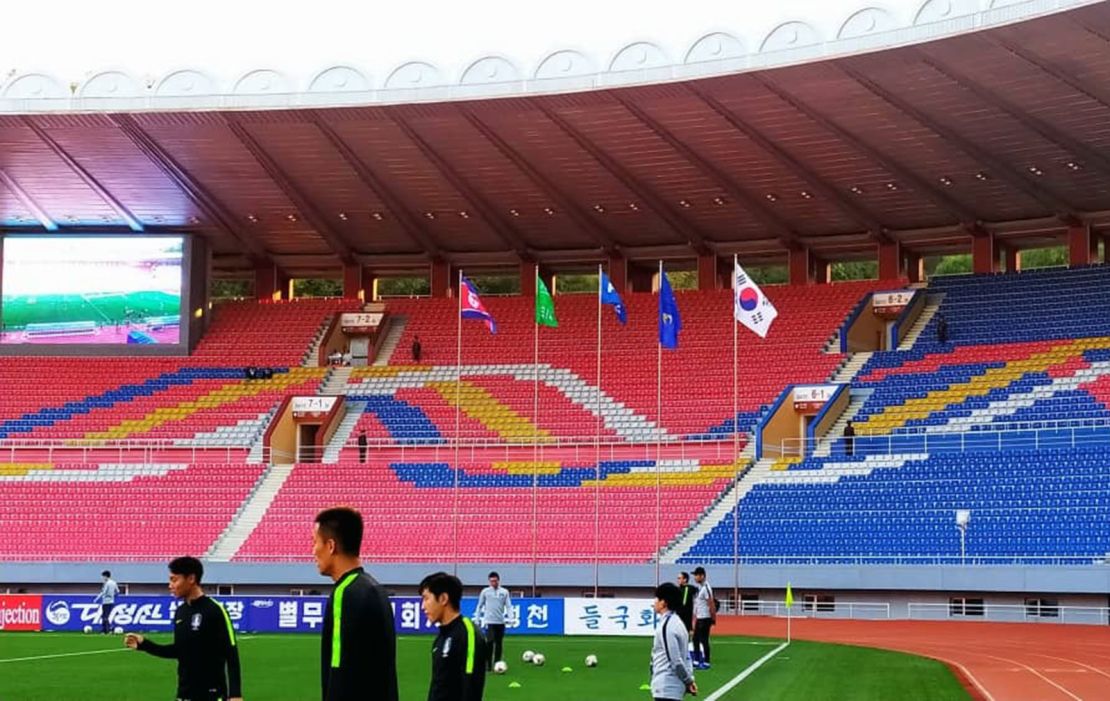 Players warm up before the match begins on October 15, 2019, at the Kim Il Sung Stadium in Pyongyang, North Korea.
