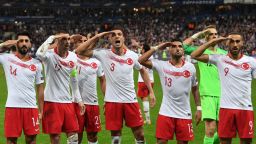 TOPSHOT - Turkish players salute at the end of the Euro 2020 Group H qualification football match between France and Turkey at the Stade de France in Saint-Denis, outside Paris on October 14, 2019. (Photo by Alain JOCARD / AFP) (Photo by ALAIN JOCARD/AFP via Getty Images)
