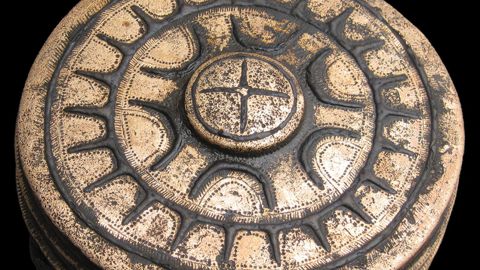 The star-ornamented belt box found at the site.