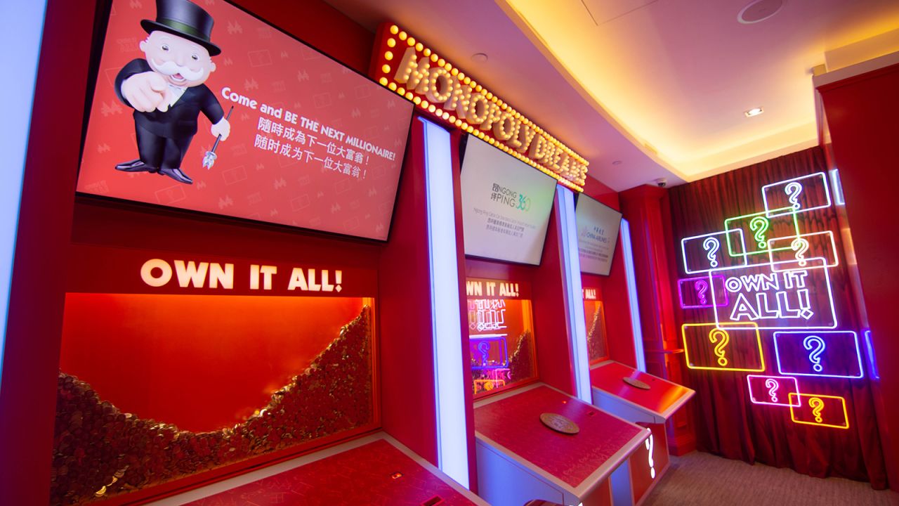 The Fortune Board gives visitors a chance to win gold tokens and plane tickets.
