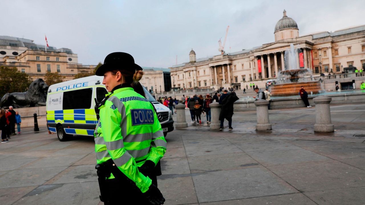 Police officers deployed around Trafalgar Square after the Extinction Rebellion protest camp was cleared overnight.
