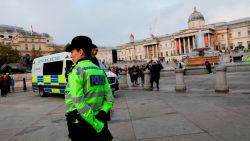 Police officers are seen deployed around Trafalgar Square in London, on October 15, 2019, after the  Extinction Rebellion protest camp was cleared overnight from the Square and as demonstrations by the climate change action group enter a ninth day. - Activists from the environmental pressure group Extinction Rebellion defiantly vowed to continue their planned two-week campaign of demonstrations in central London on October 15, despite a police ban. (Photo by ISABEL INFANTES / AFP) (Photo by ISABEL INFANTES/AFP via Getty Images)