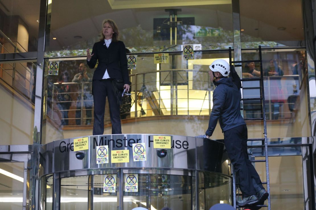 Gail Bradbrook, co-founder of Extinction Rebellion, demonstrating at the Department for Transport.